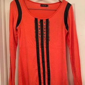 Long sleeved orange and black shirt